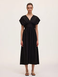Step out in style with this chic black V-neck dress featuring a flattering draped design and a cinched waist that effortlessly highlights your silhouette. Perfect for any occasion, it combines comfort and elegance with a playful twist, making you feel confident and ready to turn heads wherever you go.