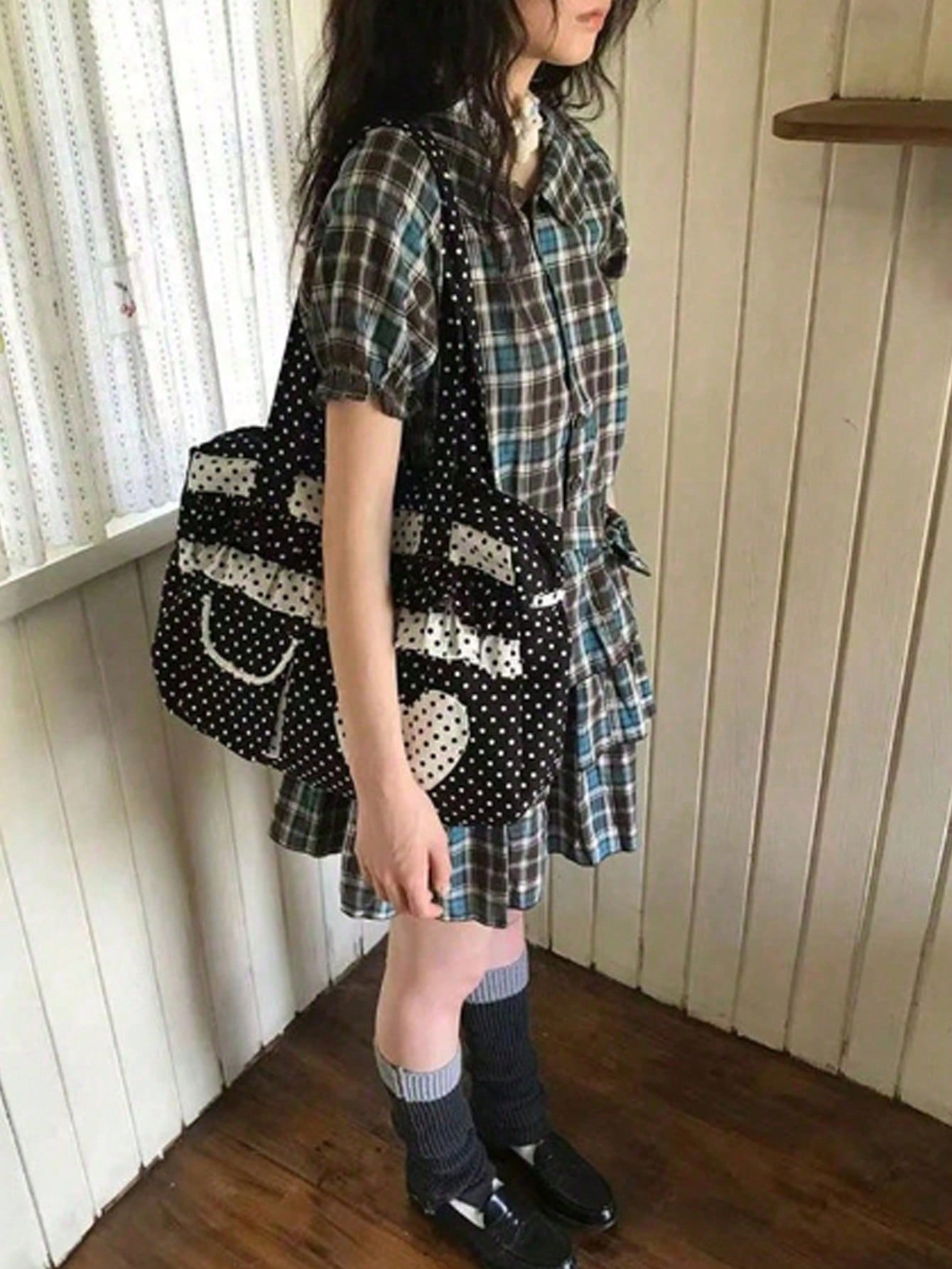 Carry your essentials in style with this charming canvas tote bag featuring a delightful black and white polka dot heart pattern. Perfect for school runs, shopping trips, or everyday adventures, this versatile bag combines playful design with practical functionality. The durable canvas construction ensures it holds up to daily wear, while the spacious interior accommodates books, groceries, and all your must-haves. Whether you're heading to class or the market, this cheerful tote adds a fun pop of personali