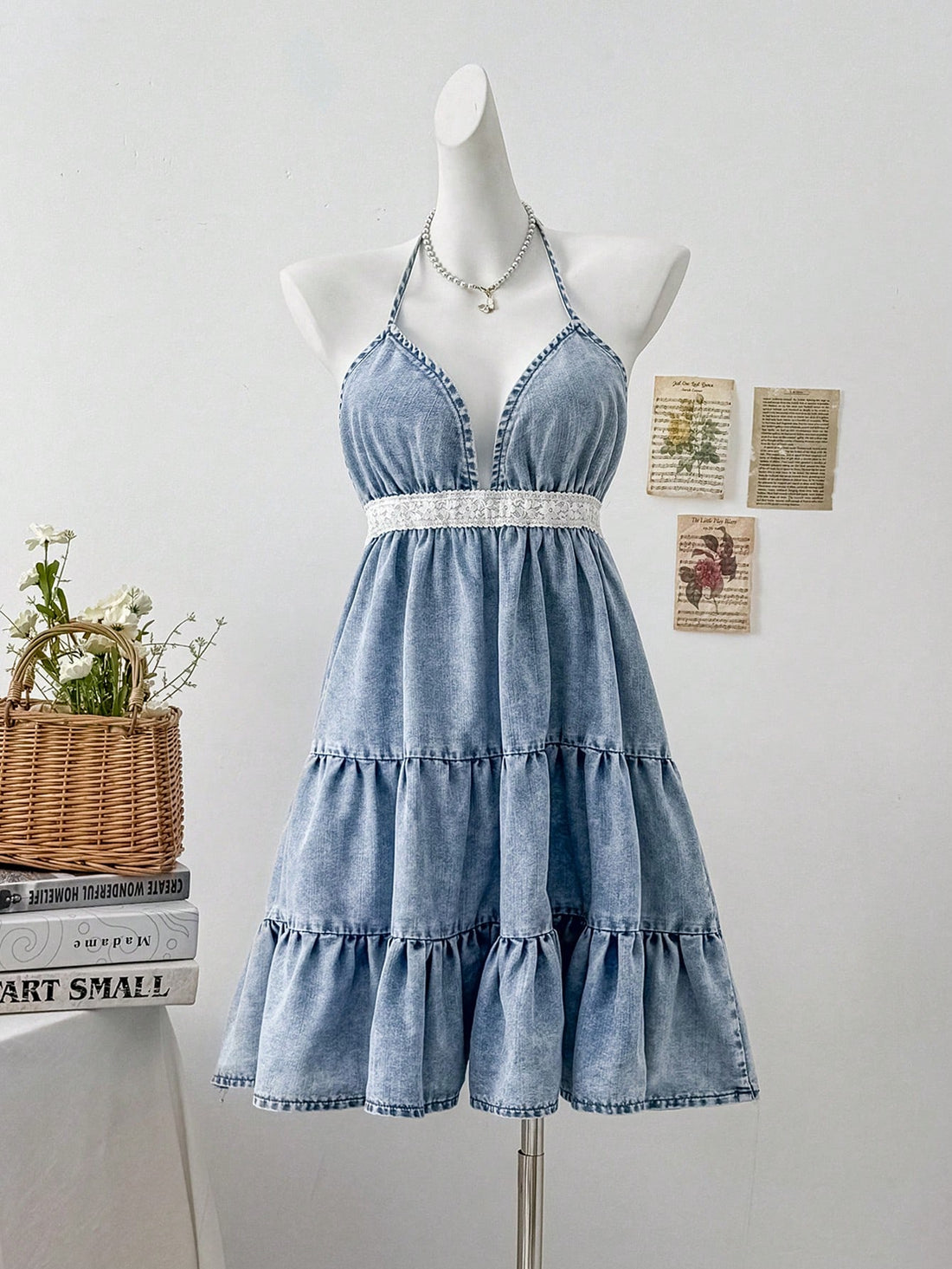 Step into summer with this playful blue denim mini dress featuring delicate spaghetti straps. Its lightweight fabric and flattering cut make it ideal for beach days, graduation parties, or vacation adventures. Effortlessly chic and fun, this dress keeps you cool while turning heads wherever you go.