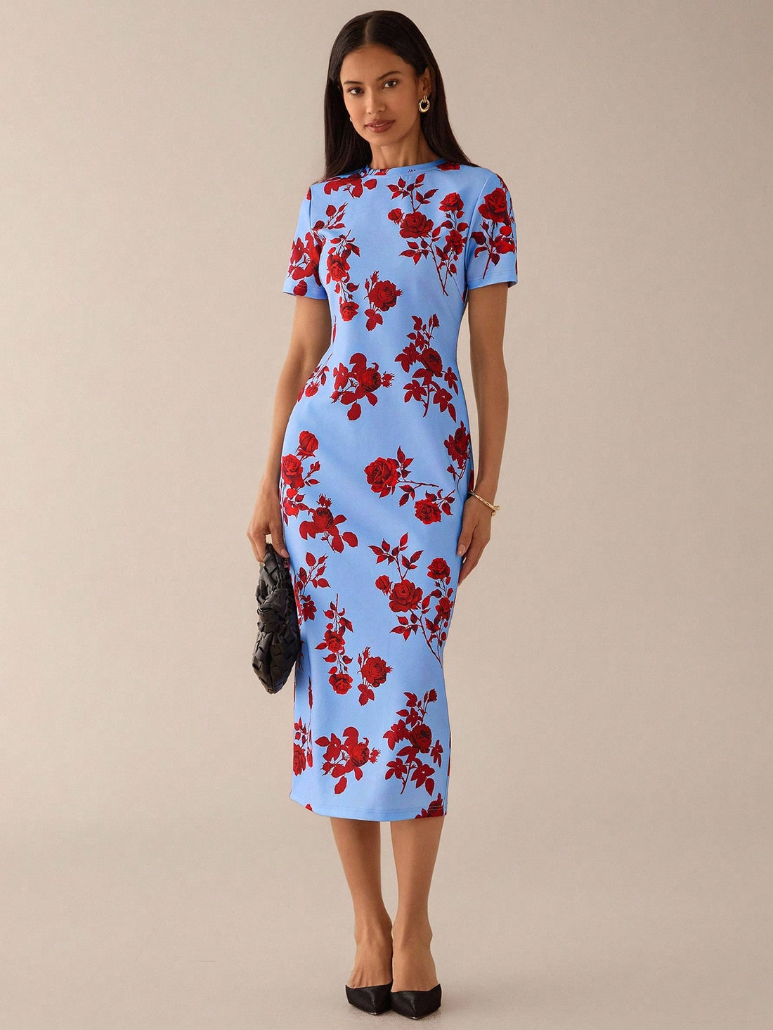 Step out in style with this playful blue floral printed mid-length dress, perfect for romantic dates or casual outings. Its charming print and flattering cut bring a fresh, fun vibe to your wardrobe, making every moment feel special and effortlessly chic.