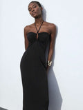 Step into style with this chic blue halter neck dress, crafted to turn heads at any fall or winter event. The playful drawstring waist lets you customize your fit, while the hollow-out details add a flirty touch of elegance. Perfect for layering or wearing solo, this dress balances cozy vibes with a bold, fashionable twist. Dance through the season with confidence and charm in this standout piece!