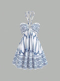 Step into summer fun with this chic blue patterned mini dress! Featuring a flirty halter tie-back and a playful flare hem, it’s perfect for sunny days and warm nights. Lightweight and breezy, this dress combines comfort with style, making it your go-to choice for casual outings or beachside adventures. Embrace the season with a splash of color and a touch of flair!