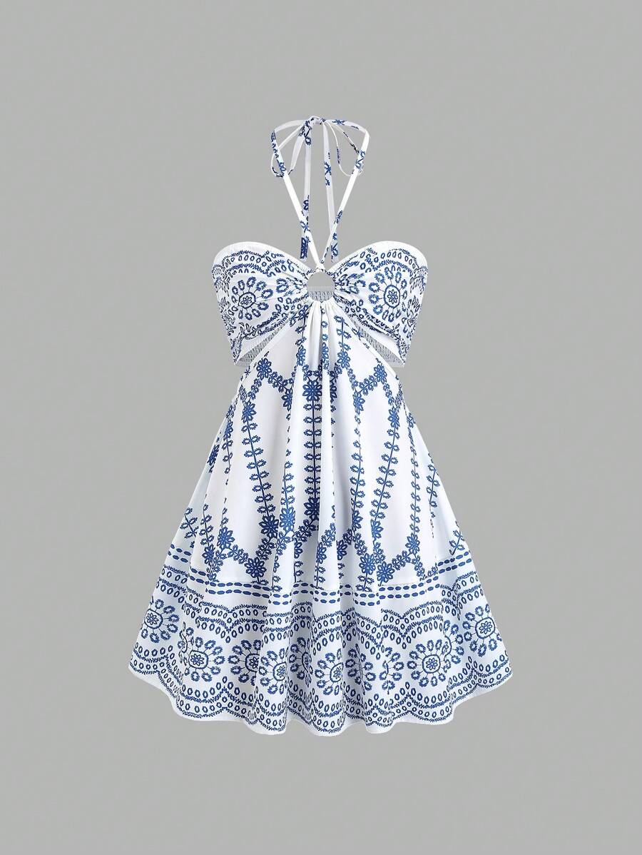 Step into summer fun with this chic blue patterned mini dress! Featuring a flirty halter tie-back and a playful flare hem, it’s perfect for sunny days and warm nights. Lightweight and breezy, this dress combines comfort with style, making it your go-to choice for casual outings or beachside adventures. Embrace the season with a splash of color and a touch of flair!