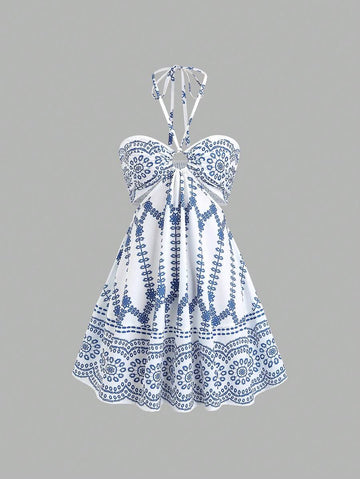 Step into summer fun with this chic blue patterned mini dress! Featuring a flirty halter tie-back and a playful flare hem, it’s perfect for sunny days and warm nights. Lightweight and breezy, this dress combines comfort with style, making it your go-to choice for casual outings or beachside adventures. Embrace the season with a splash of color and a touch of flair!