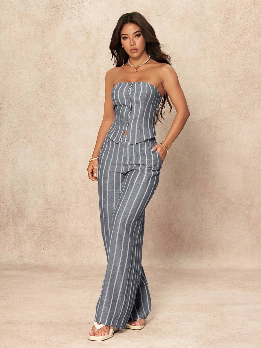 Elevate your everyday style with this chic blue and white striped set. The bandeau camisole features a sleek crop silhouette with button-front detailing, while the wide-leg pants offer a flattering extra-long cut with functional pockets. Crafted from a breathable polyester-cotton blend, this versatile pairing transitions seamlessly from office to casual outings. Perfect for creating effortless, polished looks that work year-round.