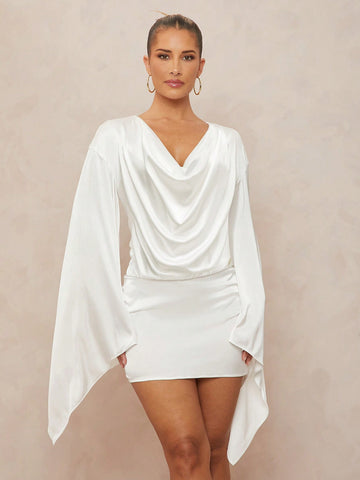Step into summer with this Chic Bohemian Asymmetrical Mini Dress—perfect for beach weddings and sunny vacations. Its playful cut and breezy design keep you cool while turning heads with effortless style. Dance through warm days and celebrate in laid-back elegance wherever your adventures take you!