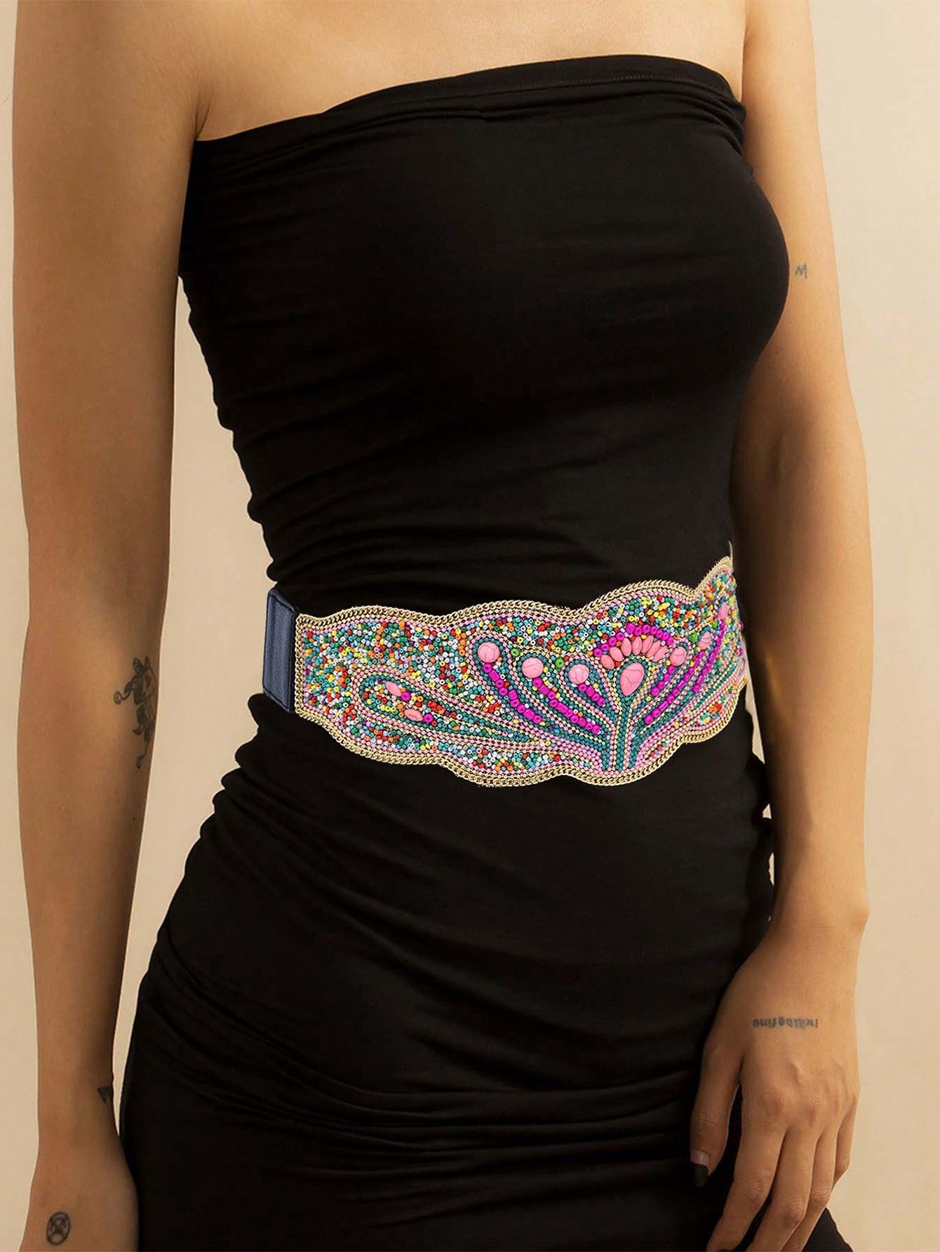 Elevate your style with our Chic Bohemian Beaded Waist Belt. Made from high-quality PU leather, this all-season accessory will add a touch of bohemian flair to any outfit. The beaded design adds a unique and eye-catching element, making it the perfect addition to your wardrobe.