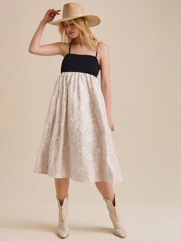 Get ready to turn heads with our Chic Bohemian dress! This black and white jacquard patchwork design is perfect for spring and summer. The mid-calf length and sleeveless style keep you cool while making a statement. Embrace your unique and playful style with this quirky dress.