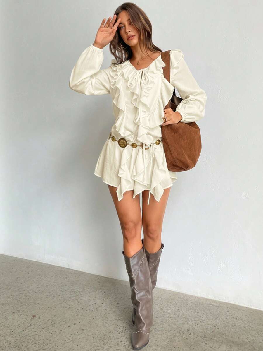 Embrace effortless elegance with this stunning bohemian brown chiffon mini dress. The flattering V-neckline draws attention upward while the delicate ruffle hem adds a playful twirl to every step. Crafted from lightweight chiffon, it's the perfect layering piece for autumn and winter transitions. Whether you're heading to a casual brunch or a cozy evening out, this dress delivers boho charm with modern sophistication. Pair it with boots and a leather jacket for an edgy vibe, or keep it romantic with delicat