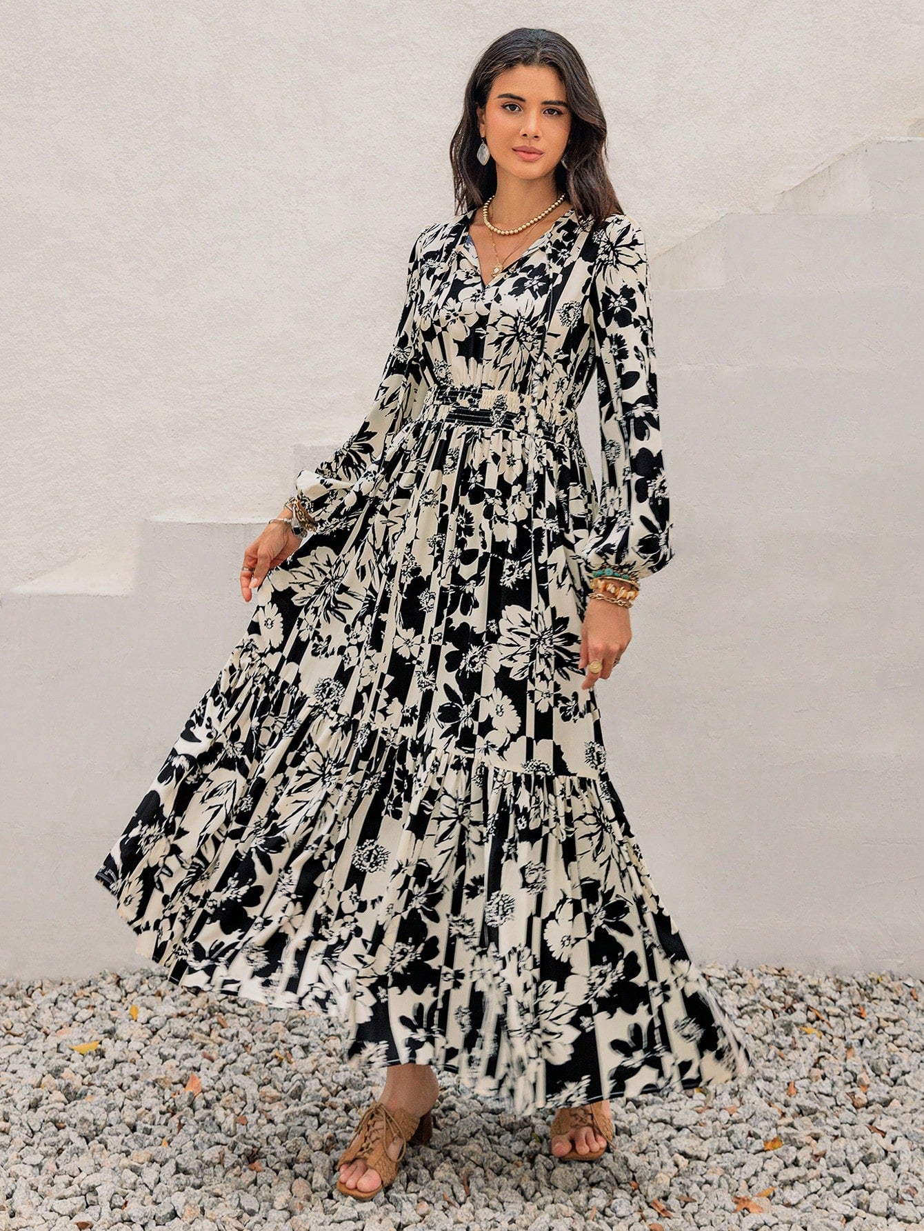 Effortlessly elevate your holiday style with our Chic Bohemian Floral Lantern Sleeve Dress. The delicate floral pattern paired with lantern sleeves adds a touch of bohemian charm. Perfect for any occasion, this dress will have you looking chic and stylish without any effort.