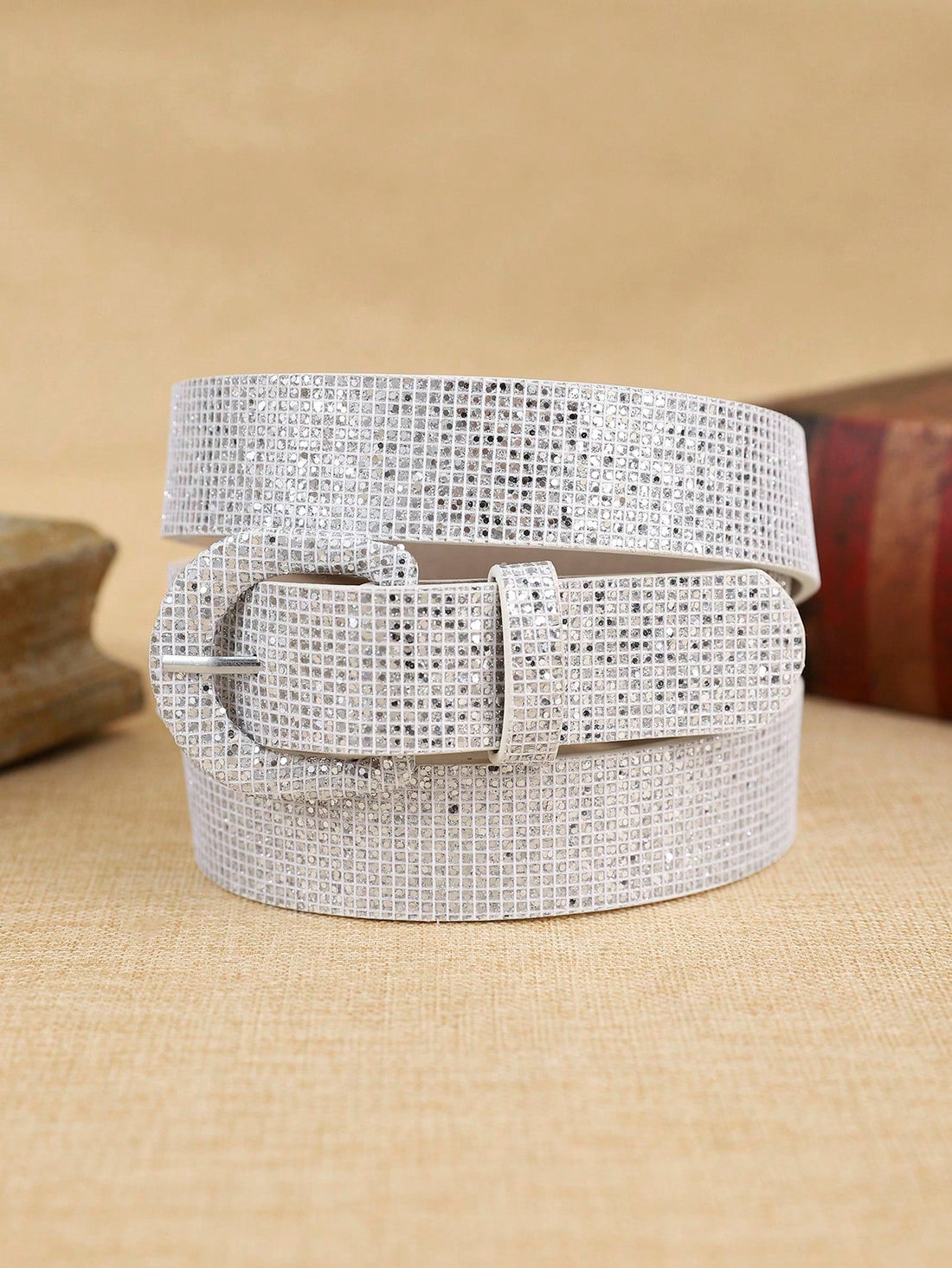 This Chic Bohemian Glitter Buckle Waist Belt is a stylish and versatile accessory that adds a touch of glamour to any outfit. Made from high-quality PU material, it is both durable and fashionable. Elevate your everyday fashion with this must-have accessory.