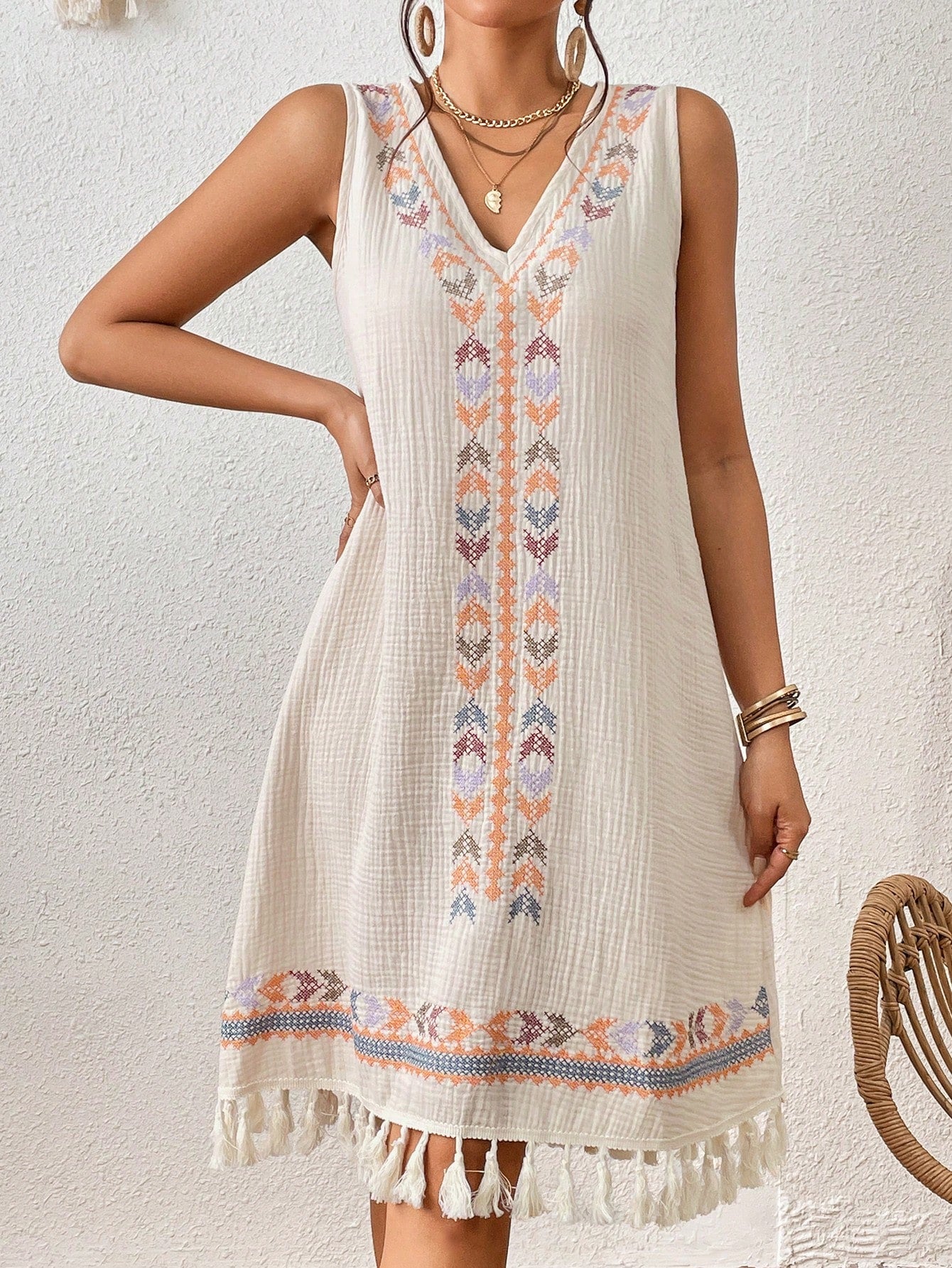 Experience effortless style and comfort with our Chic Boho Summer Dress. Featuring a striking Geo Print and playful Tassel Hem, this dress is perfect for any summer occasion. Made with high-quality materials, it will keep you cool and stylish all day long. Upgrade your wardrobe with this must-have dress.