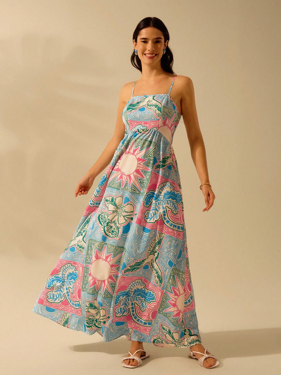 Get ready for the ultimate summer beach look with our Chic Boho Tropical Print Halter Dress! With its bold and vibrant design, this dress is perfect for all your beach getaways. Its halter neckline and flowy fit will keep you cool and stylish all day long. Don't miss out on the perfect summer dress!