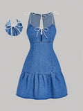 Get ready to strut your stuff in this chic denim dress! With a playful bow accent and flirty ruffle hem, this sleeveless dress is perfect for fashion-forward women. Say goodbye to boring outfits and hello to style that stands out. (Bow and ruffle included - no assembly required!)