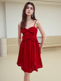 Step into playful sophistication with this Chic Bow-Decorated Fold Pleated Cami Dress. Its delicate pleats and charming bow detail add a flirty touch, making it perfect for effortless elegance at any occasion. Lightweight and breezy, this dress lets you twirl through your day with confidence and style.