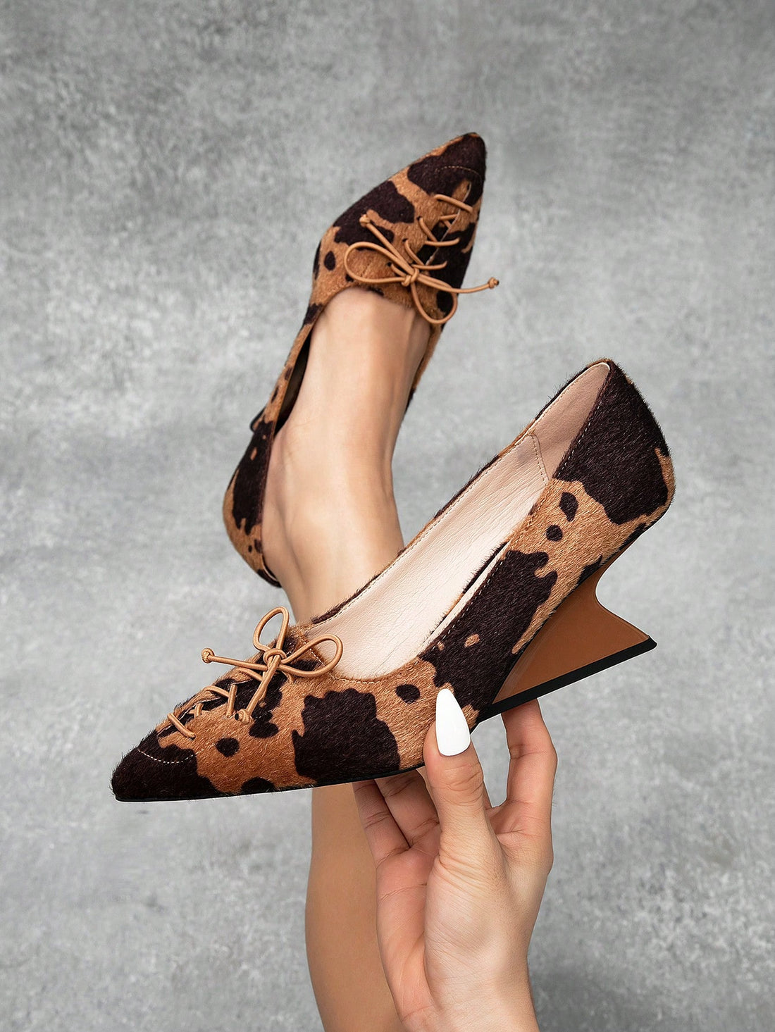 Effortlessly elevate your everyday style with our Chic Bow-Detail Wedge Platform Slip-On Shoes. The sleek design and delicate bow detail add a touch of sophistication, while the wedge platform provides comfort and height. Perfect for any occasion, these slip-on shoes are a must-have for your wardrobe.