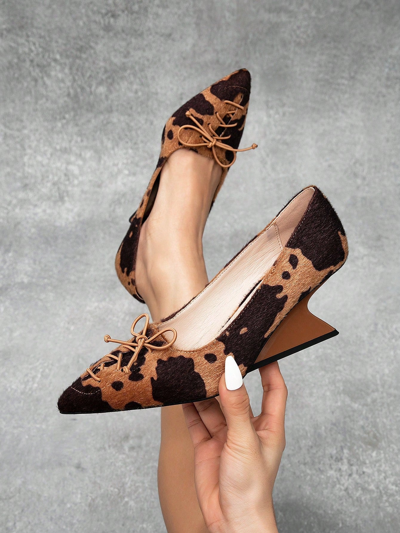 Effortlessly elevate your everyday style with our Chic Bow-Detail Wedge Platform Slip-On Shoes. The sleek design and delicate bow detail add a touch of sophistication, while the wedge platform provides comfort and height. Perfect for any occasion, these slip-on shoes are a must-have for your wardrobe.