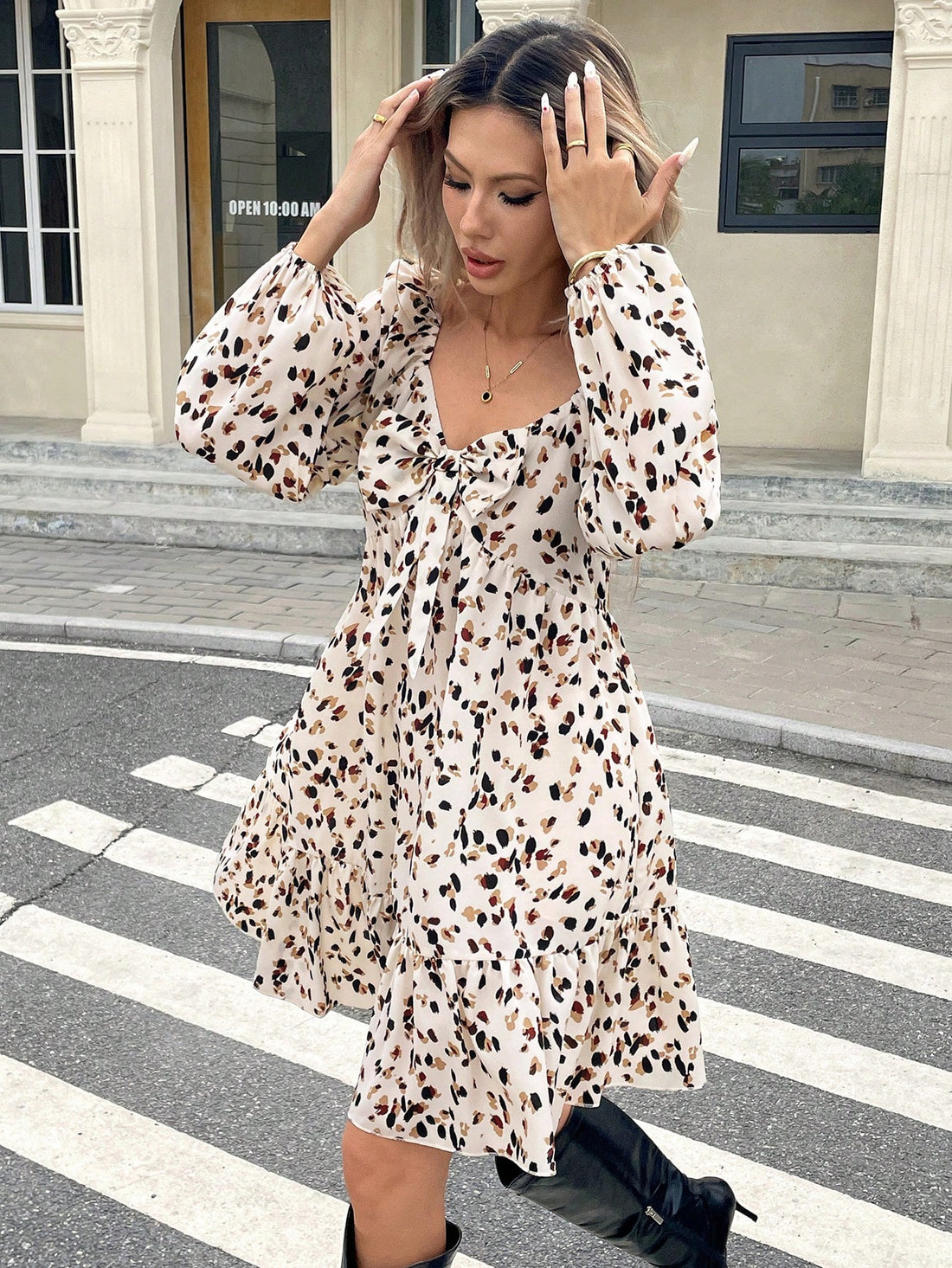 Effortlessly chic! This sundress features an allover print and a bow-embellished design for a playful touch. Perfect for spring and autumn style, this dress is a must-have for any fashion-forward woman. (Psst...also great for those days when you want to feel pretty without trying too hard!)