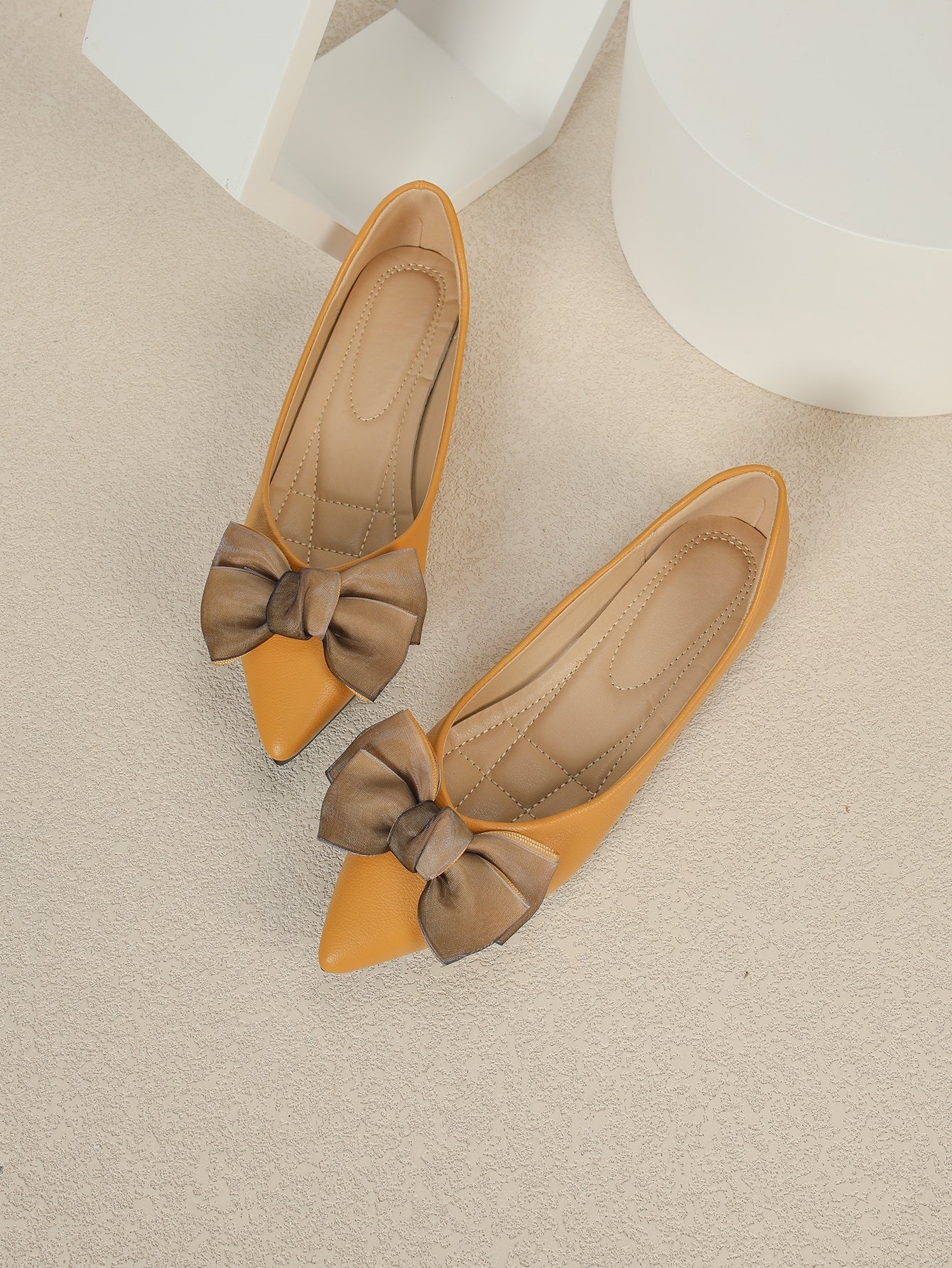 Effortlessly chic and stylish, these pointed toe ballet flats are the perfect addition to your Valentine's Day ensemble. With a playful bow decor, these flats elevate any outfit with a touch of romance. Walk with style and comfort this Valentine's Day!