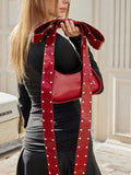 Indulge in your love for fashion with our Chic Bow Decor Shoulder Bag! Made of high-quality PU leather, this bag features a stylish bow design and edgy rivet detailing. Perfect for Valentine's Day, it's a must-have for any fashion-forward individual.