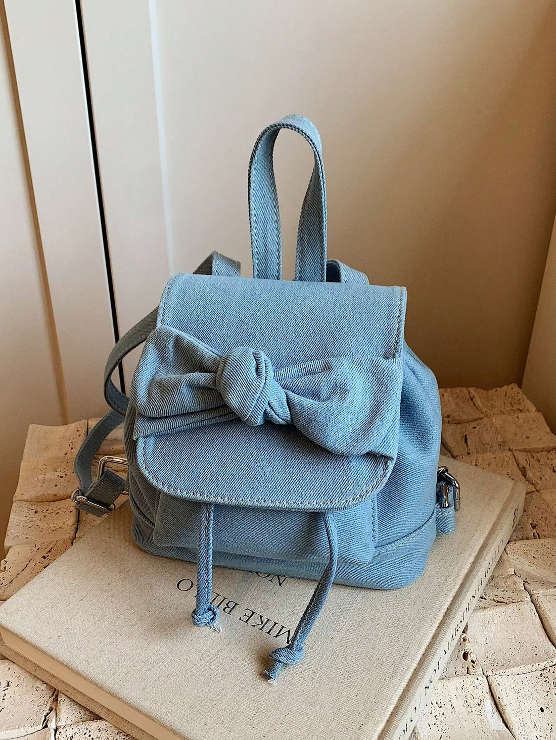 This Chic Bowknot Backpack is the perfect gift for any fashionable woman. With its elegant bowknot design and spacious interior, it's both stylish and practical. Surprise your date with this trendy accessory, perfect for any occasion. A must-have for any fashion-forward woman.