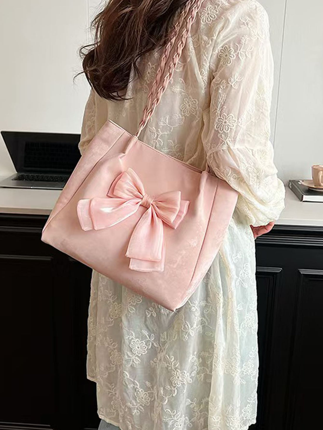 Add a pop of fun to your daily routine with the Chic Bowknot Tote Bag! This roomy companion is perfect for stashing all your essentials—whether you're commuting or exploring the city. The charming bowknot detail adds a playful twist to your look, making it as stylish as it is practical. Lightweight yet spacious, it keeps you organized without weighing you down. Ready, set, tote in style!