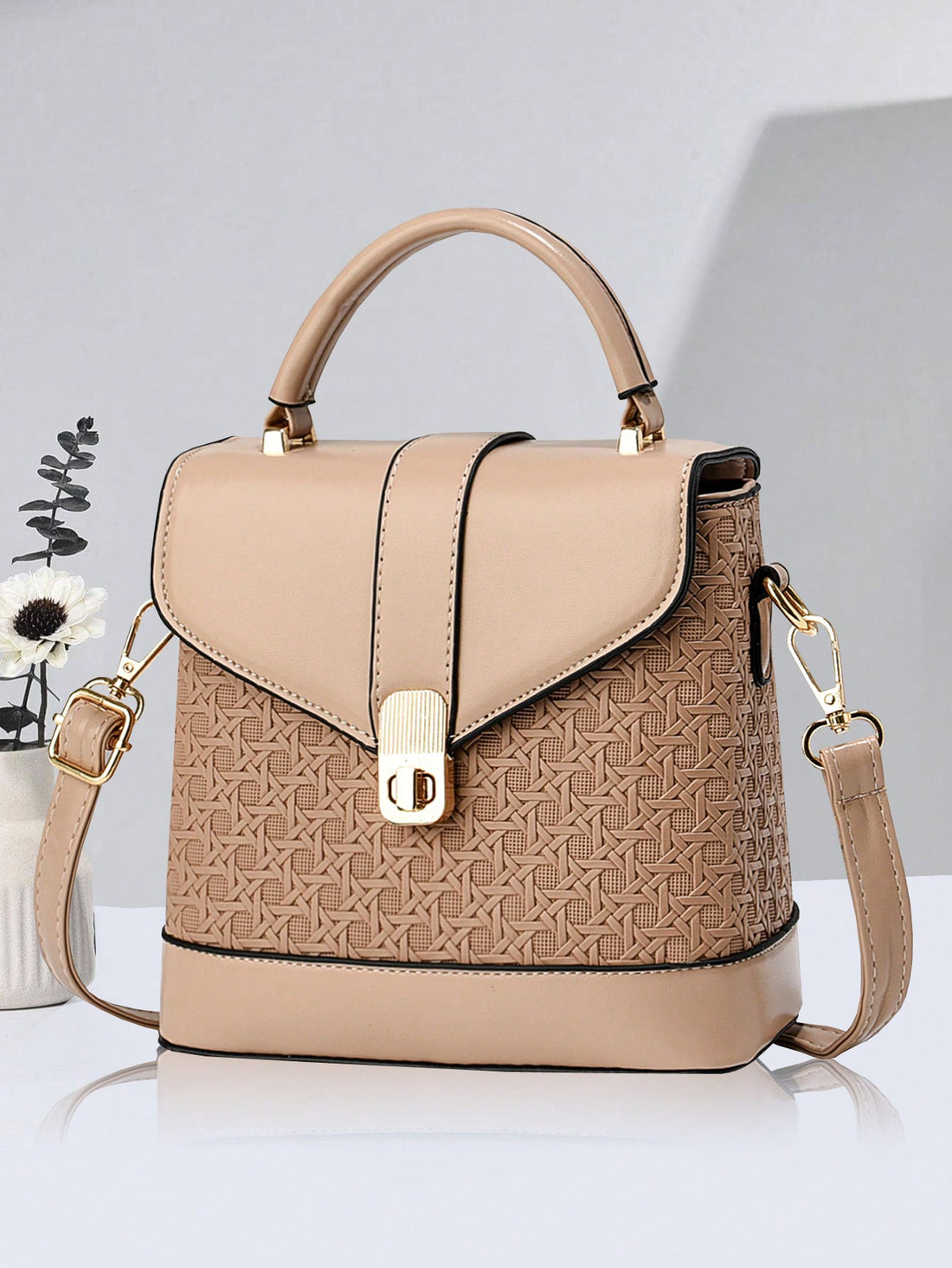 This Chic Box Shaped Shoulder Bag is an excellent Valentine's Day gift for the special woman in your life. Its unique box shape adds a touch of sophistication to any outfit, while the spacious interior and adjustable strap provide functionality. Made with quality materials, this bag is both durable and stylish. Perfect for the fashion-forward and practical woman.