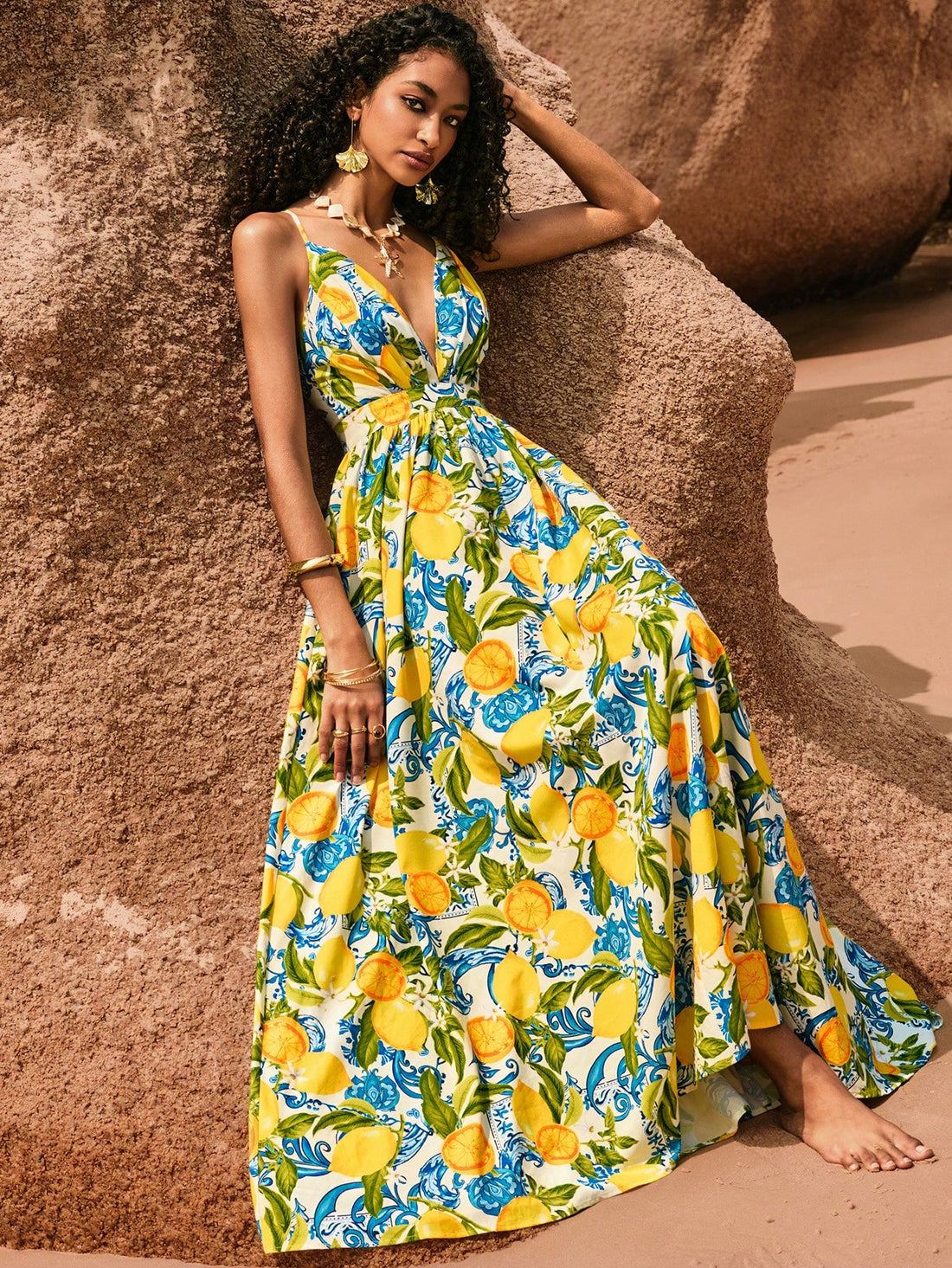 Unleash your ultimate vacation vibes with our chic & breezy backless maxi beach dress. Designed with a playful printed pattern, this dress will have you feeling stylish and comfortable while strolling on the beach. Say goodbye to boring vacation outfits and hello to ultimate vacation vibes!