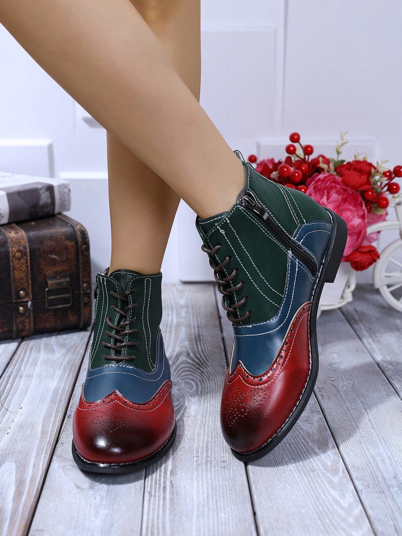 Elevate your style game with our chic British style brogue patchwork boots! These retro 3-strap leather footwear for women are the perfect combination of fashion and function. The patchwork design adds a unique touch while the straps provide a secure fit. Step out in confidence and make a statement with these boots.