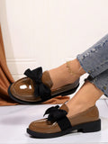 These chic brown bow-embellished slip-on flats offer versatile comfort for every season. With their stylish design and easy slip-on feature, they are perfect for any occasion. Made with high-quality materials, these flats provide lasting comfort and support throughout the day. Elevate your wardrobe and step out in style with these must-have flats.