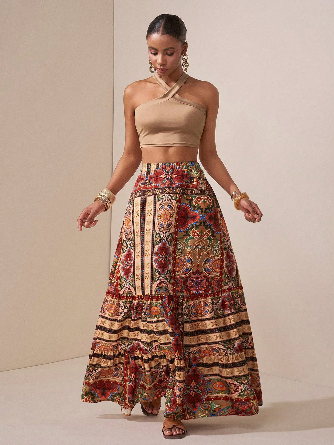 Escape to relaxation in this dreamy two-piece set that practically packs itself! The silky brown camisole pairs perfectly with a flowing long skirt, creating an effortless look that transitions seamlessly from beachside brunch to sunset strolls. Whether you're lounging by the pool or exploring a new destination, this versatile duo keeps you looking put-together without the fuss. Comfort meets style in every wear—your vacation wardrobe just got a whole lot easier!