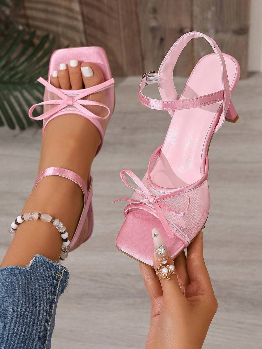 Step up your style game with these chic brown mesh high heel sandals! Featuring a playful bow and a sleek backstrap, these stilettos are perfect for turning heads at any formal event. The breathable mesh adds a flirty touch while keeping you comfortable enough to dance the night away. Elevate your outfit instantly with this fun and fashionable choice!