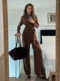 Elevate your everyday wardrobe with this versatile brown two-piece set that effortlessly bridges casual and polished looks. The minimalist long-sleeve top pairs perfectly with tailored pants, creating endless styling possibilities from coffee dates to office meetings. Crafted for comfort without compromising on sophistication, this set is your go-to for looking put-together with zero fuss. Mix, match, and make it yours—because great style should be simple and fun!