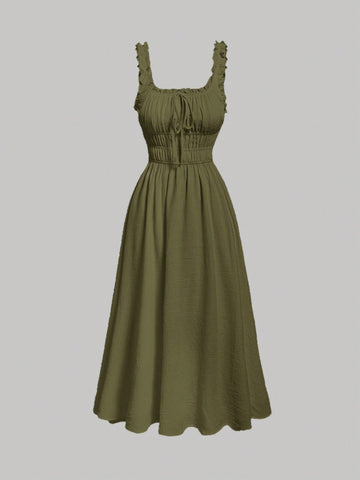 Step into style with this chic brown long tank dress, featuring elegant pleats and a playful tie bow. Its solid color makes it a versatile choice for both back-to-school days and work meetings. Comfortable and flattering, this dress adds a touch of fun sophistication to your wardrobe.