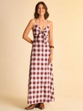 Step into sunny days with this Chic Brown and White Plaid V-Neck Sleeveless Dress. The playful tie knot detail adds a flirty twist, while its breezy sleeveless design keeps you cool and comfy. Perfect for effortless summer vibes, this dress blends classic plaid with a fun, fresh silhouette you'll want to wear everywhere.