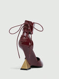 Step into the spotlight with these stunning burgundy pointed-toe heels that command attention. The asymmetrical design adds an unexpected twist, making them a conversation starter at any event. Whether you're dancing the night away or making a grand entrance, these heels deliver confidence with every step. The rich burgundy hue pairs effortlessly with little blacks, metallics, or bold prints. Elevate your party look and own the room in style.