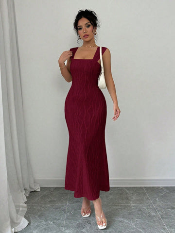 Make a statement in this Chic Burgundy Square Neck Backless Mermaid Hem Dress. Perfect for any occasion, this dress will elevate your style with its unique design and bold color. The square neck adds a touch of sophistication while the backless feature adds a flirty element. The mermaid hem will accentuate your curves for a flattering fit. Show off your playful side with this dress!