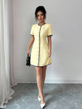 Experience the breathtaking fusion of professional heritage and sharp, modern architectural tailoring. This stunning button-trim ensemble is meticulously designed for the woman who values a high-fashion, 