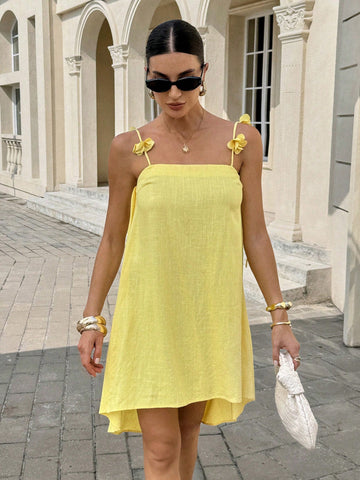 Brighten your summer days with this playful butter yellow dress, featuring charming 3D floral accents that add a touch of whimsy. Its sleeveless design keeps you cool and comfortable, making it the perfect choice for sunny outings or casual gatherings. Embrace effortless style and a cheerful vibe wherever you go!