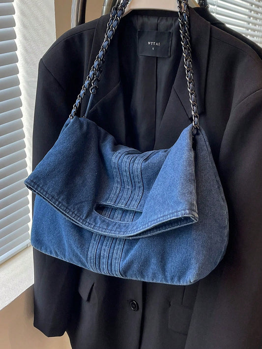 This Chic Canvas Shoulder Bag is not only stylish with its elegant solid color design, but also functional with its durable canvas material. The chain handle adds a touch of sophistication, making it the perfect accessory for any woman. Stay fashionable and organized with this must-have bag.