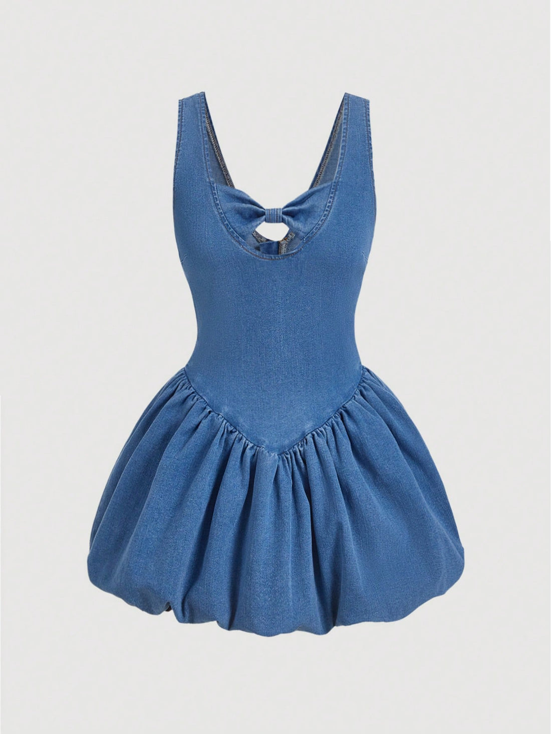 Feel effortlessly chic in this Casual Tulip Hem Denim Dress! The playful bow detail adds a touch of whimsy to this stylish piece. Perfect for any casual occasion, this dress is sure to become a staple in your wardrobe. (No need to be serious, it's just a dress!)