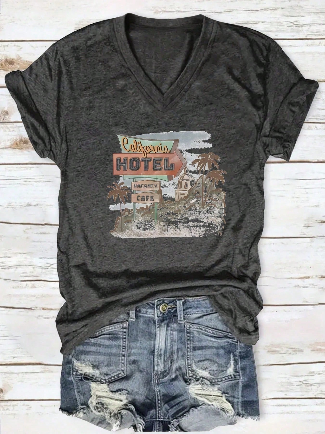 Rock your everyday style with our Chic Casual V-Neck T-Shirt! Made with a trendy print and a comfortable v-neck design, this shirt is perfect for adding a touch of chic to any outfit. Whether you're headed to brunch or running errands, this shirt is sure to elevate your look with its effortless style.