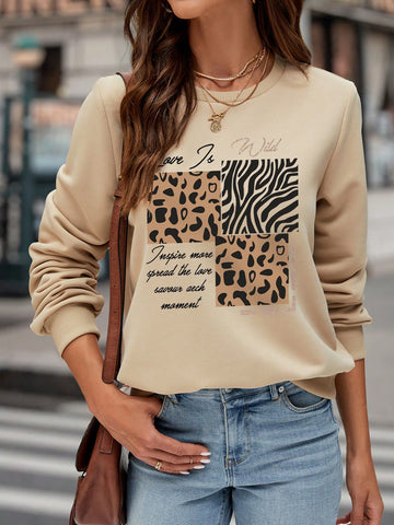 Embrace your wild side with this chic sweatshirt! Featuring a trendy leopard and zebra print, it offers a loose fit for ultimate comfort and style. Perfect for adding some playful vibes to any casual outfit.