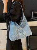 Add a splash of fun to your daily look with this Chic Casual Washed Jeans Crossbody Bag. Crafted from stylish washed denim, it blends casual cool with roomy practicality, perfect for holding all your commuting essentials. Its hobo shape drapes comfortably on your shoulder, making busy days feel a little lighter and a lot more playful. Whether you're running errands or meeting friends, this bag is your new go-to for effortless style and convenience.