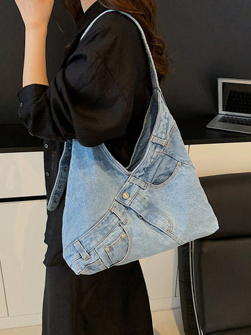 Add a splash of fun to your daily look with this Chic Casual Washed Jeans Crossbody Bag. Crafted from stylish washed denim, it blends casual cool with roomy practicality, perfect for holding all your commuting essentials. Its hobo shape drapes comfortably on your shoulder, making busy days feel a little lighter and a lot more playful. Whether you're running errands or meeting friends, this bag is your new go-to for effortless style and convenience.