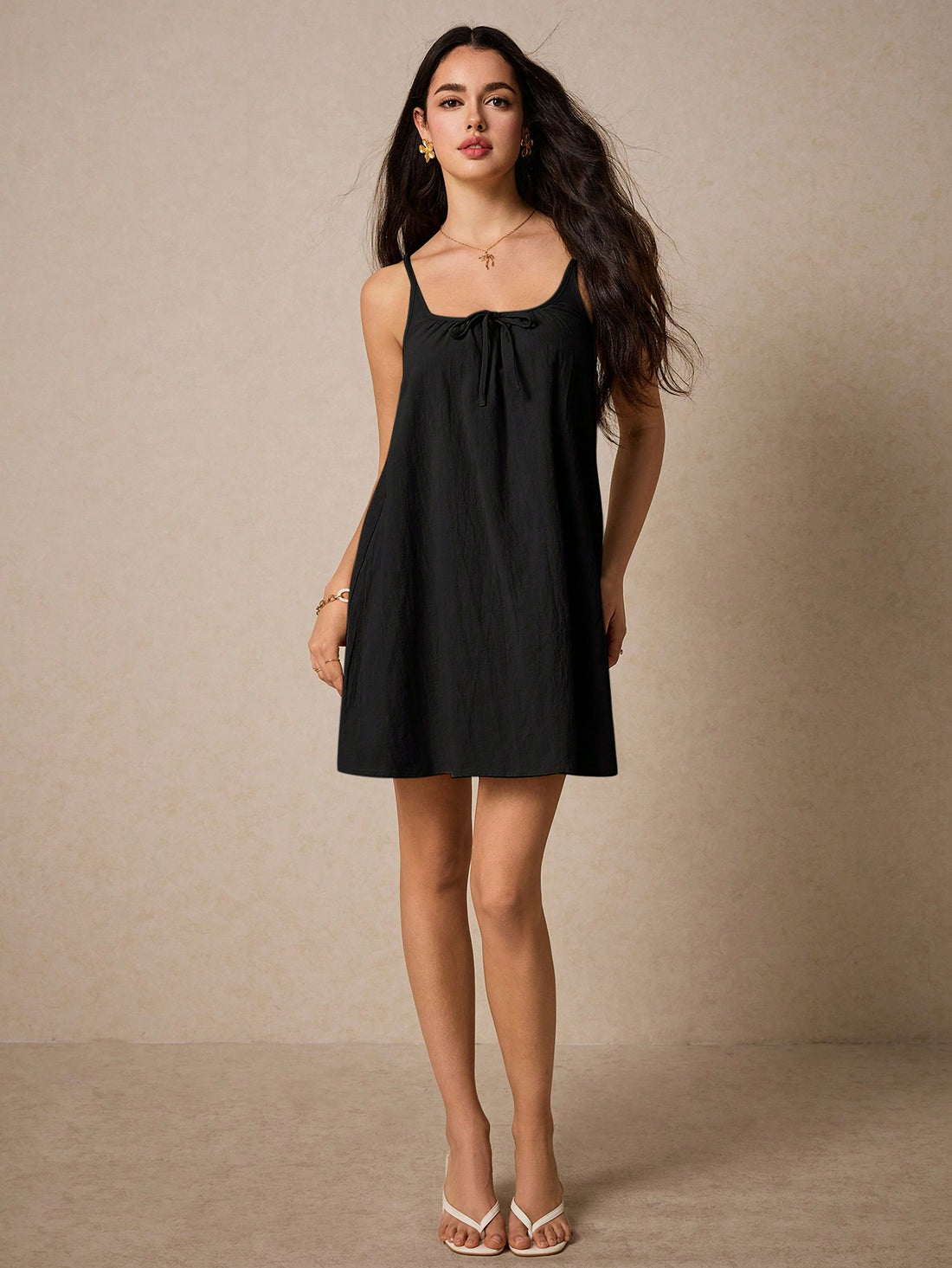Look effortlessly stylish in our Chic & Casual dress! Featuring a flattering spaghetti strap design and a front tie, this solid color dress is perfect for any occasion. With its versatile look, you can dress it up or down, making it a must-have addition to your wardrobe.