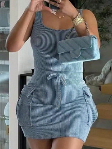 Get ready to rock the club in this Chic & Casual Mini Dress. Featuring a tie-front design and wide straps, this dress effortlessly combines style and comfort. With its convenient pockets, you'll have everything you need at your fingertips. Let loose and have fun!