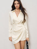 Turn heads with this Chic Champagne V-Neck Ruched Satin Mini Dress, sparkling with delicate rhinestone accents. Its flattering ruched design hugs your curves, while the smooth satin fabric adds a touch of luxury. Perfect for parties, date nights, or any occasion where you want to shine and feel fabulous!