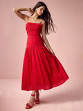 Elevate your summer style with our Chic Charm dress. This romantic red dress features a gathered trim and sling design for effortless elegance. Say goodbye to boring outfits and hello to playful sophistication. (Only 42 words so far!)