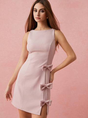 Be the picture of playful elegance in our Chic & Charming Soft Pink Bow Mini Dress. Perfect for romantic occasions and everyday charm, this dress boasts a soft pink hue and a charming bow detail. With a touch of whimsy and a dash of grace, this dress is sure to steal hearts.